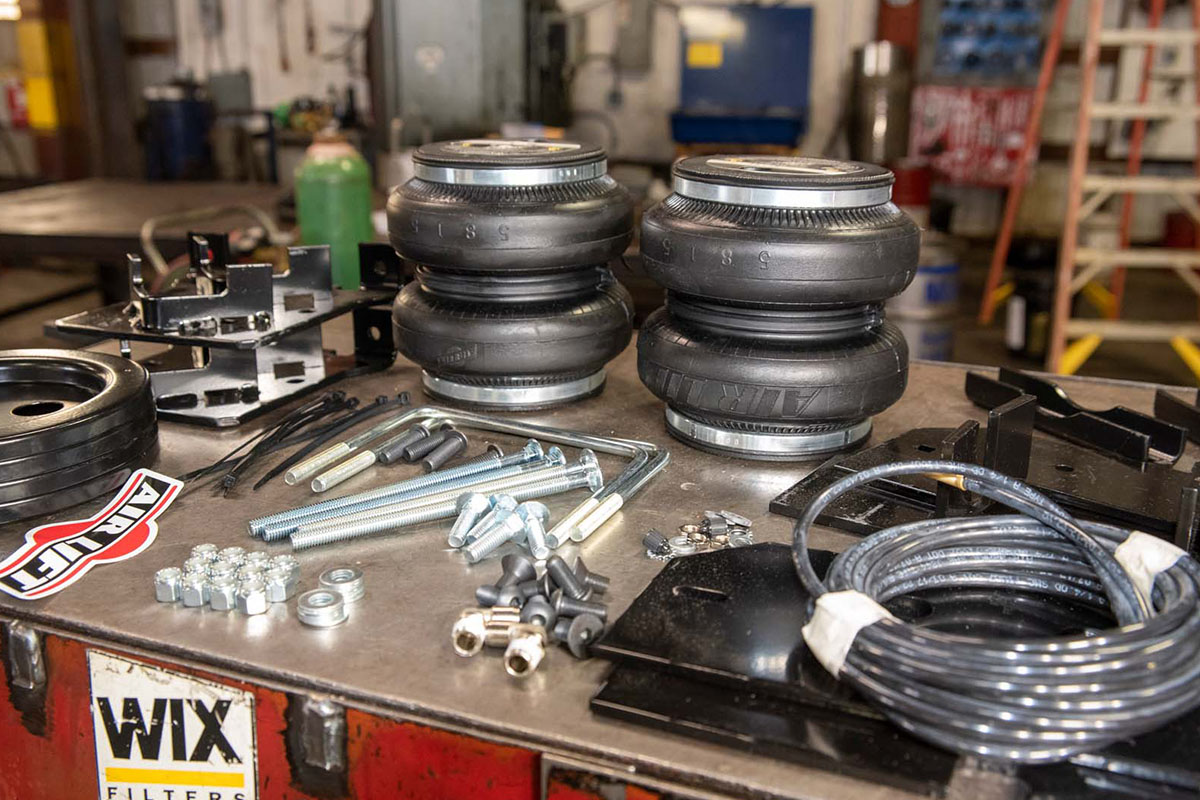 Air Lift’s LoadLifter 7500XK kit comes with everything needed to bolt the heavy-duty helper springs in place from axle brackets to air lines. It doesn’t come with an air compressor or controller, which are part of the Air Lift optional WirelessAir system. 