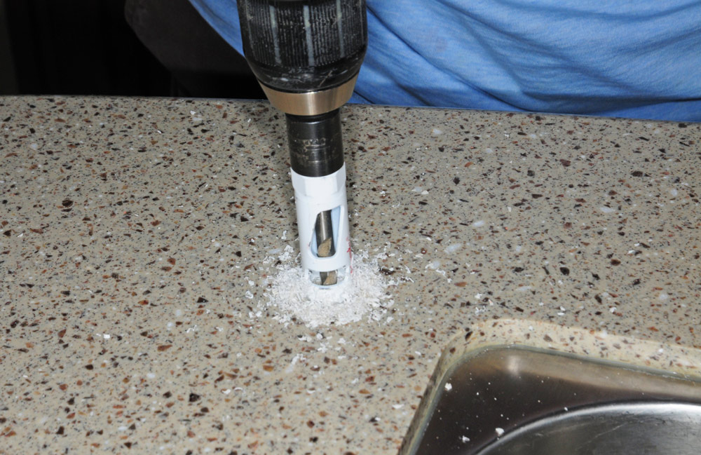 a ¾-inch hole must be drilled into the counter top