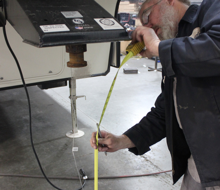 measuring the distance with a tape measurer