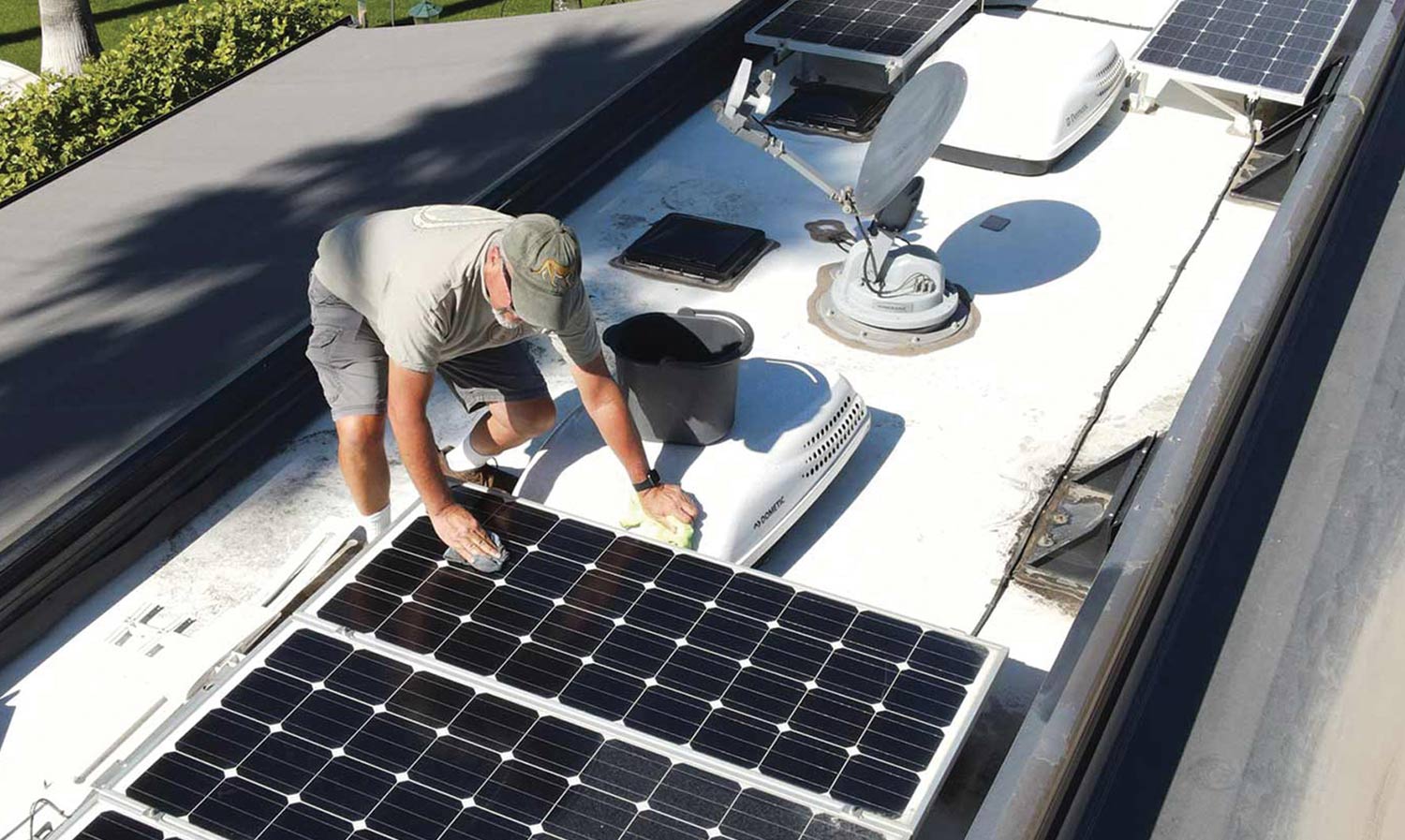 Man on top of RVE's solar