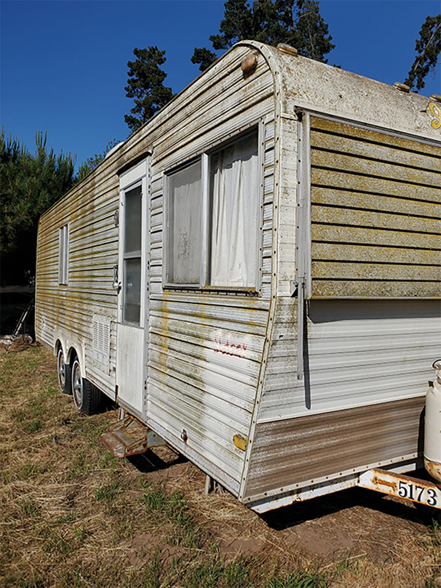 the exterior "before" view of the 1974 Ideal travel trailer