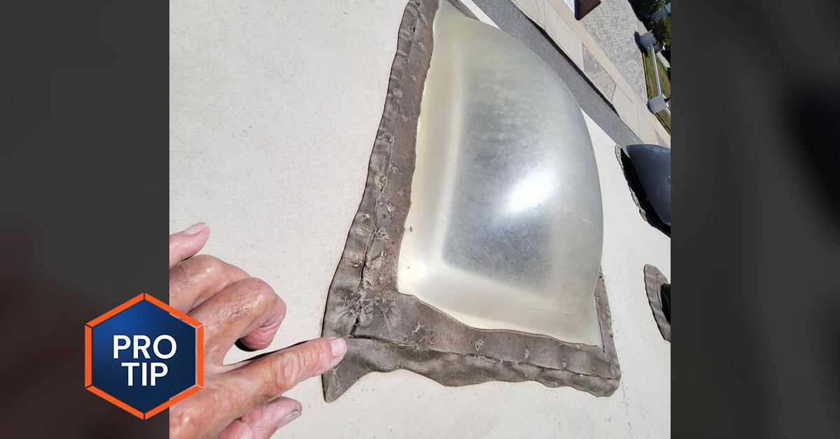 hand motions to cracked sealant around an RV skylight