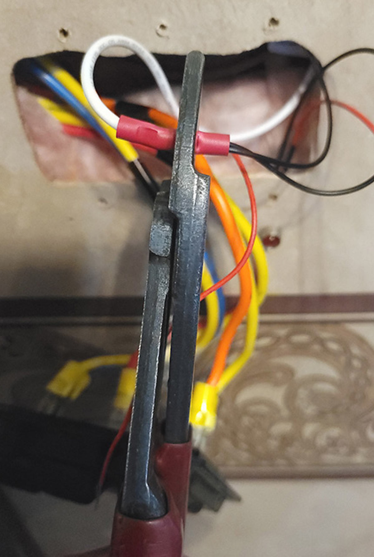 light switch wiring being crimped