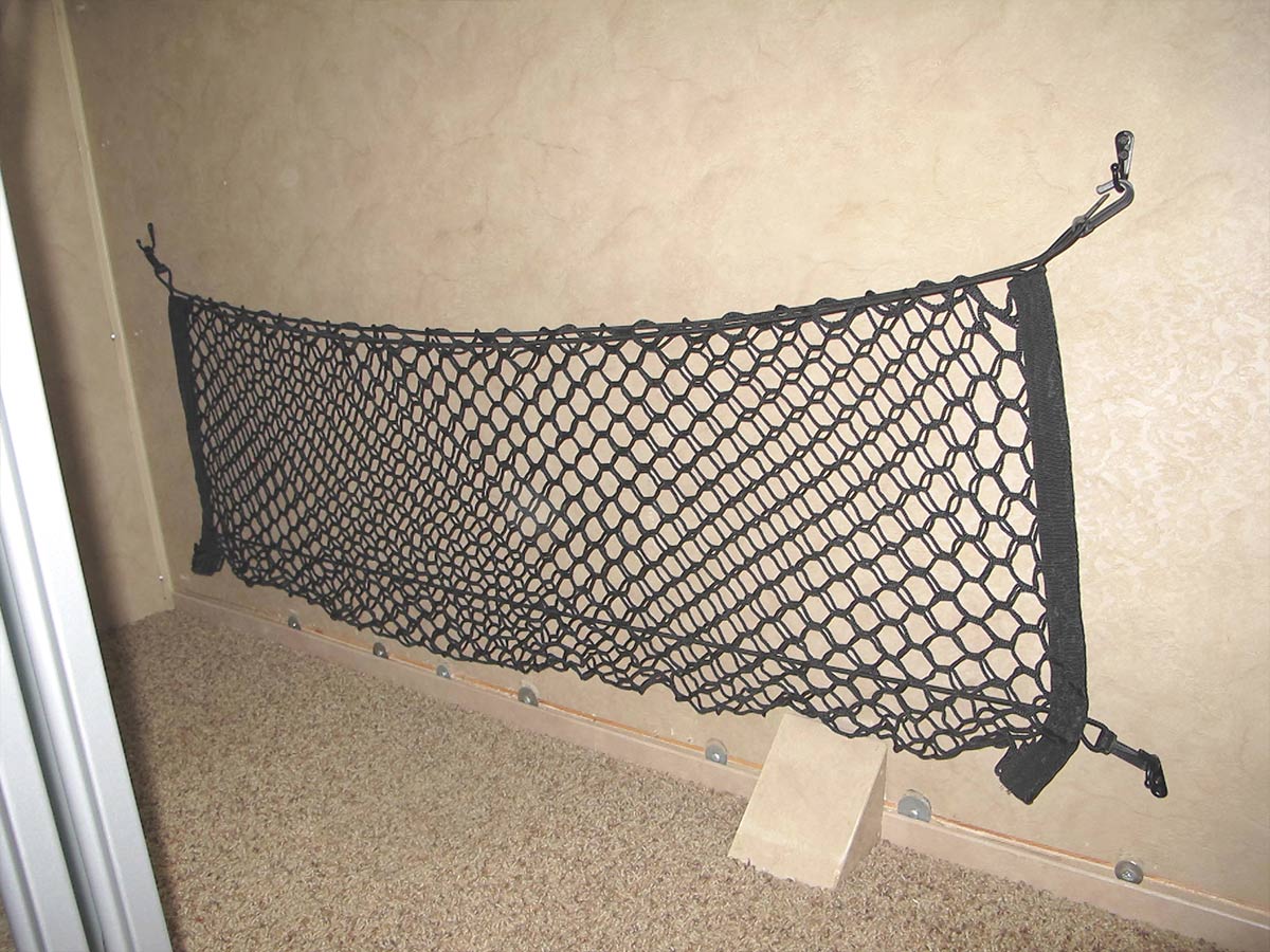 full view of the newly installed cargo net, just above the floor