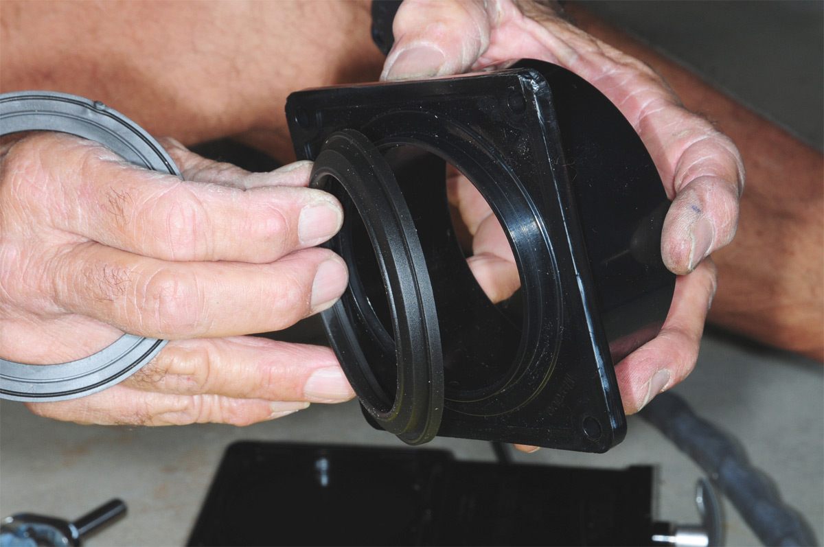 the gasket is secured to the slip-hub flange