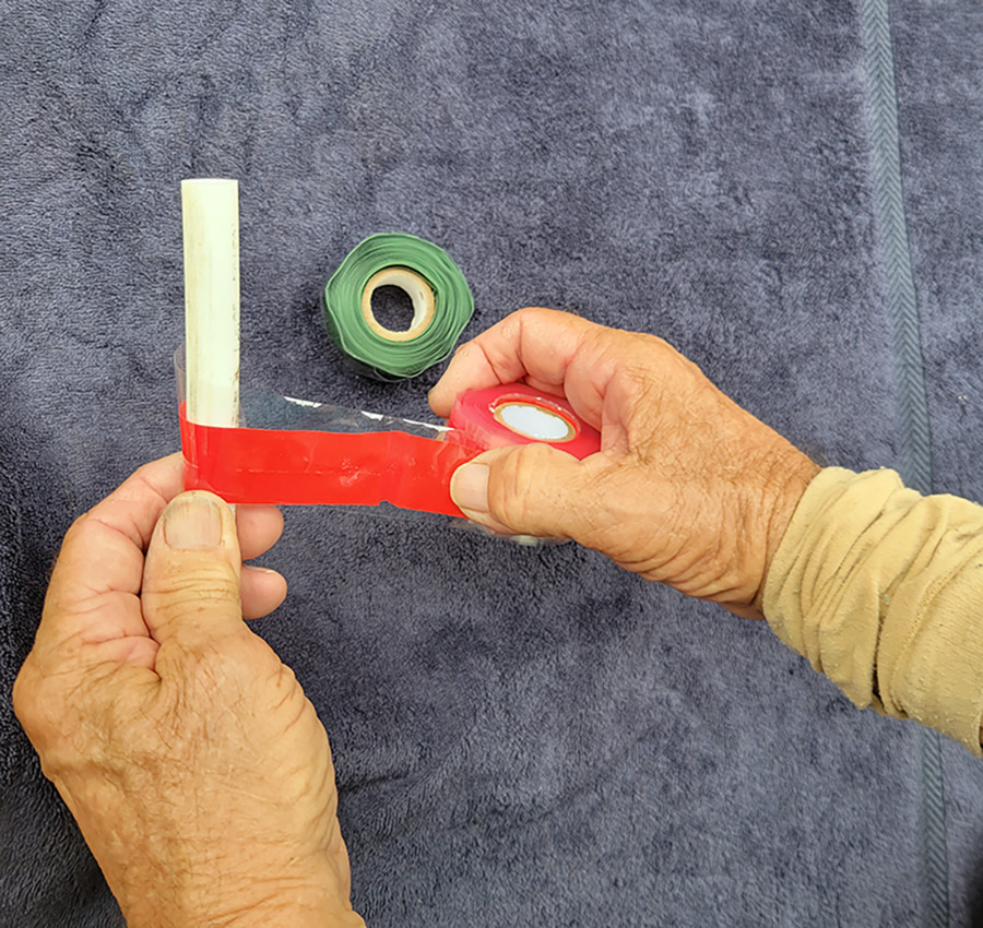 Self-fusing silicone tape is used as a temporary fix on a pipe