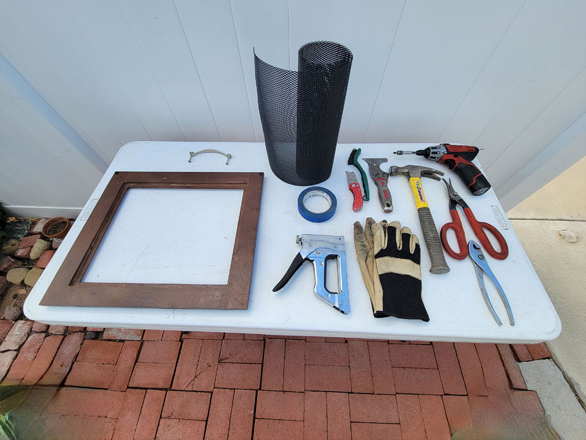 all of the tools for the aluminum mesh screen upgrade lay on a table