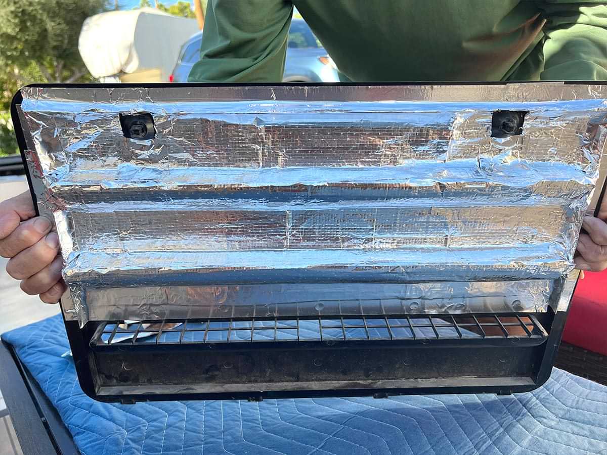 the completed vent covering, lined with Kozy Wrap with the bottom row of vent holes on each panel left open to allow for some airflow into the refrigerator compartment
