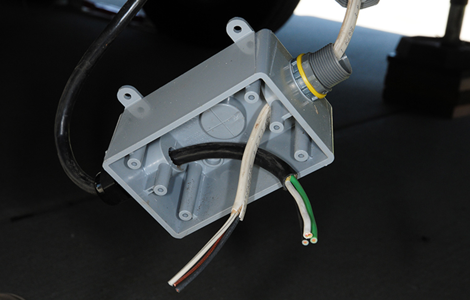 the junction box with wires fed through