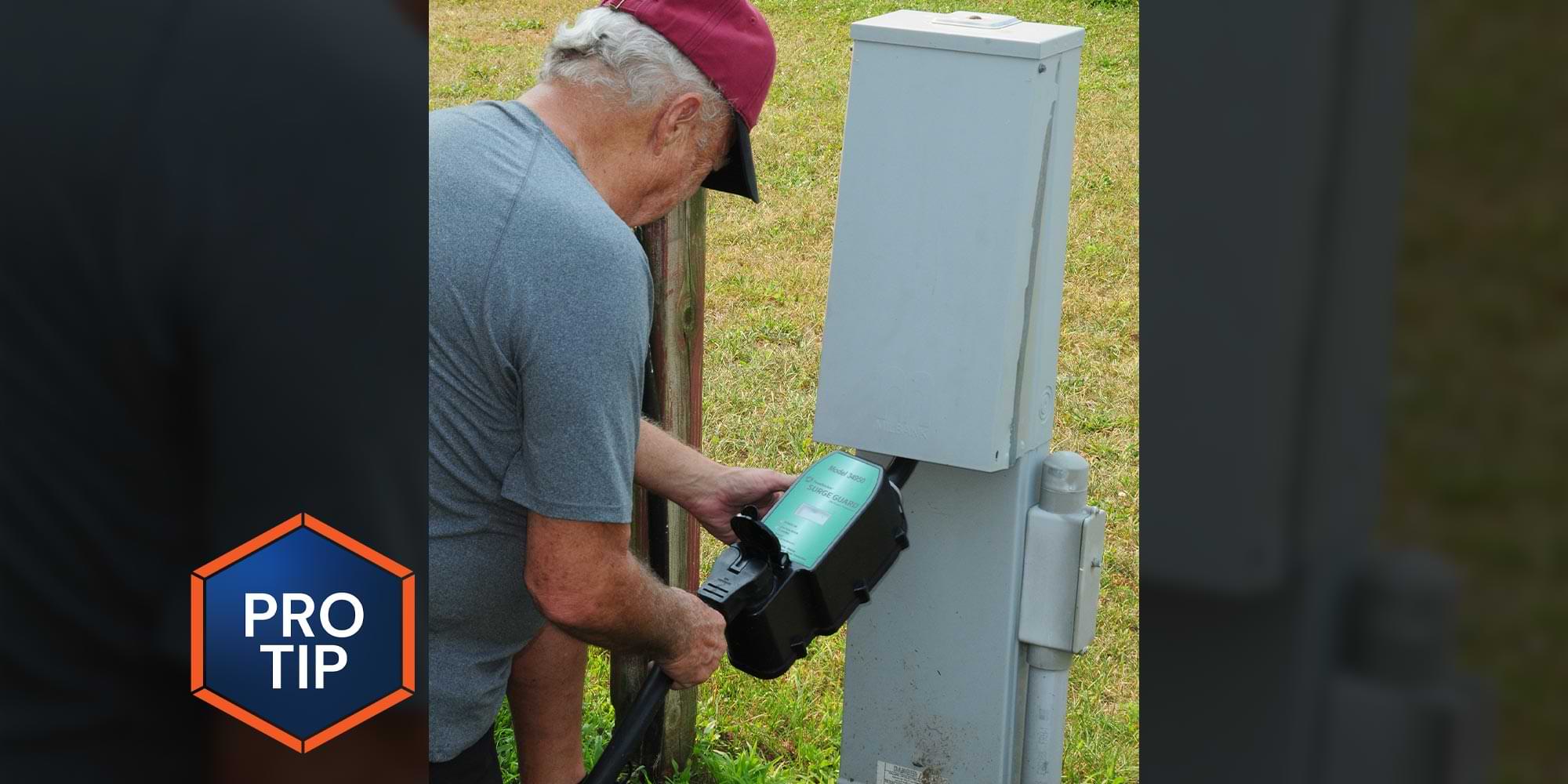 a man uses a surge guard on an outdoor electrical outlet