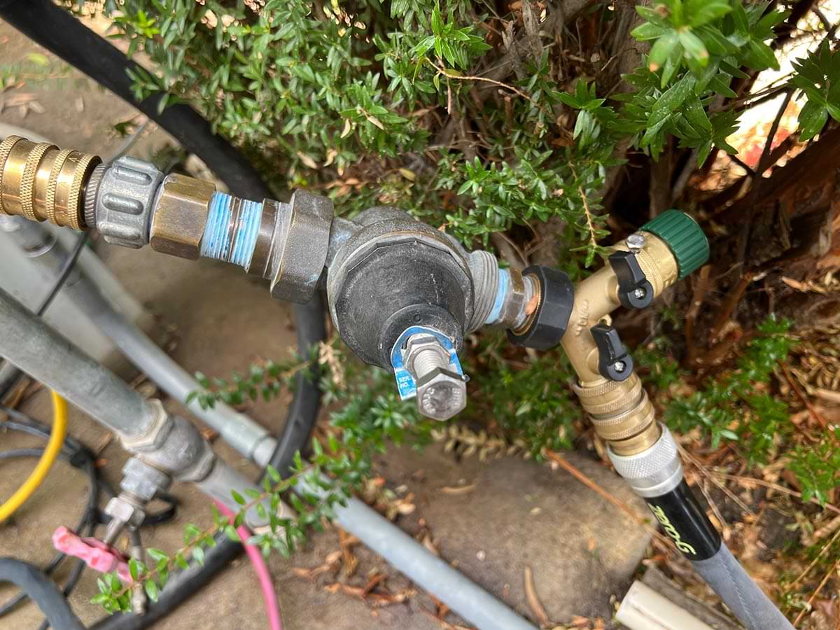 the wye adapter rotated to keep the hose out of the bushes and trees