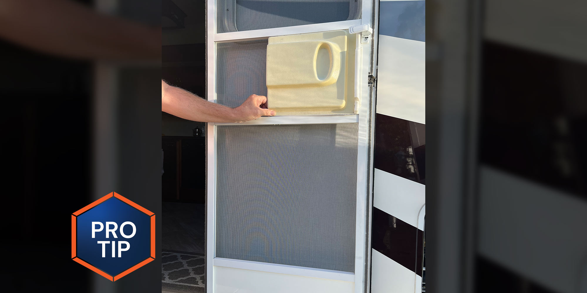 an RV screen door with a yellowed slider panel