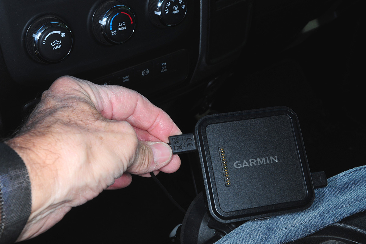 the dash cam power cable is connected to a Garmin RV 1090 that was previously installed in the vehicle