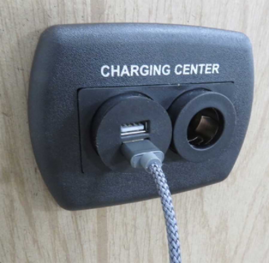 close view of a multi-device charging station connected to a wall