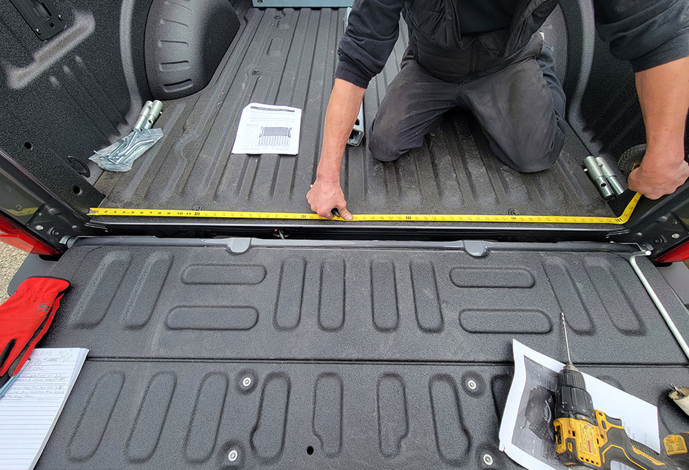using tape measure in truck bed