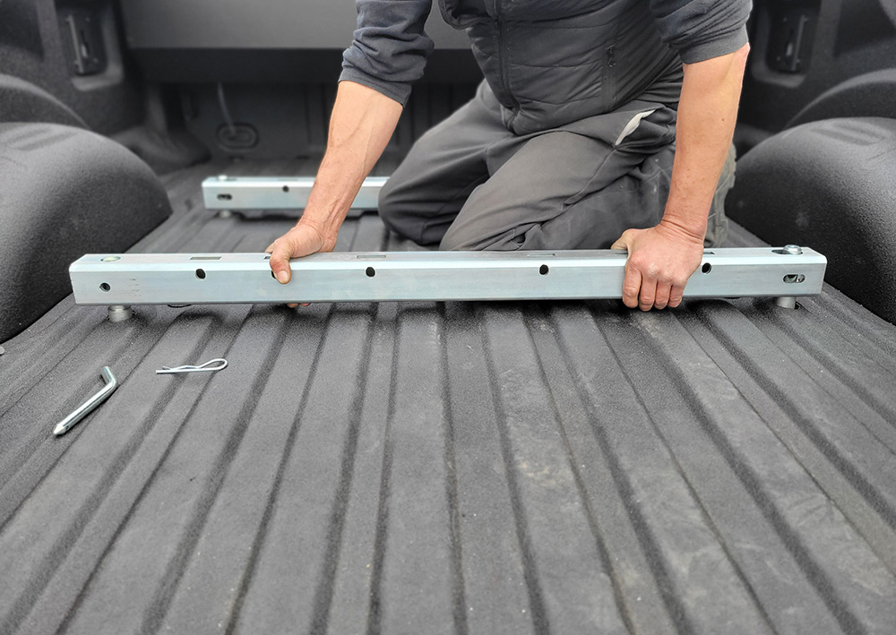 placing rails onto the truck bed floor