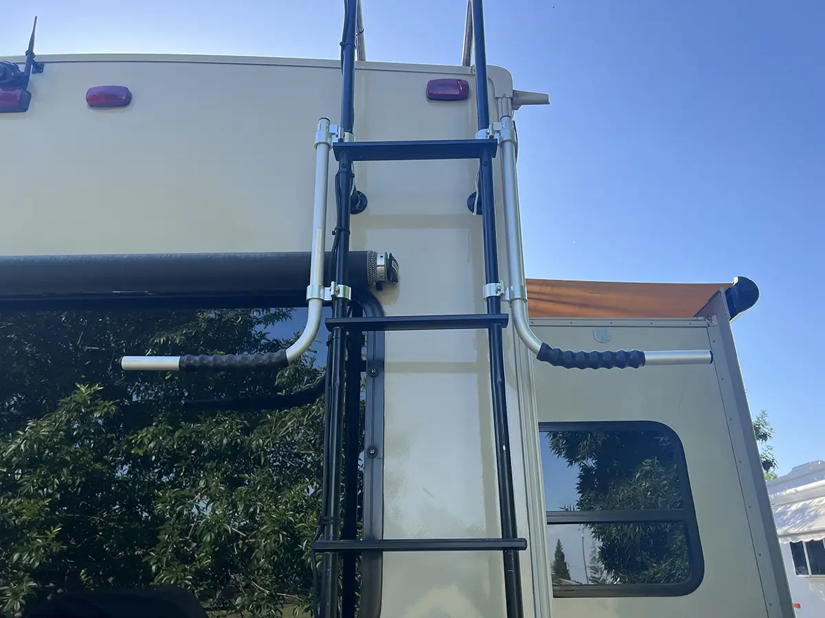 A unique feature is to remove the locking pins from their respective holders, which release the arms and allow them to swing out of the way, freeing the ladder rungs from obstructions.