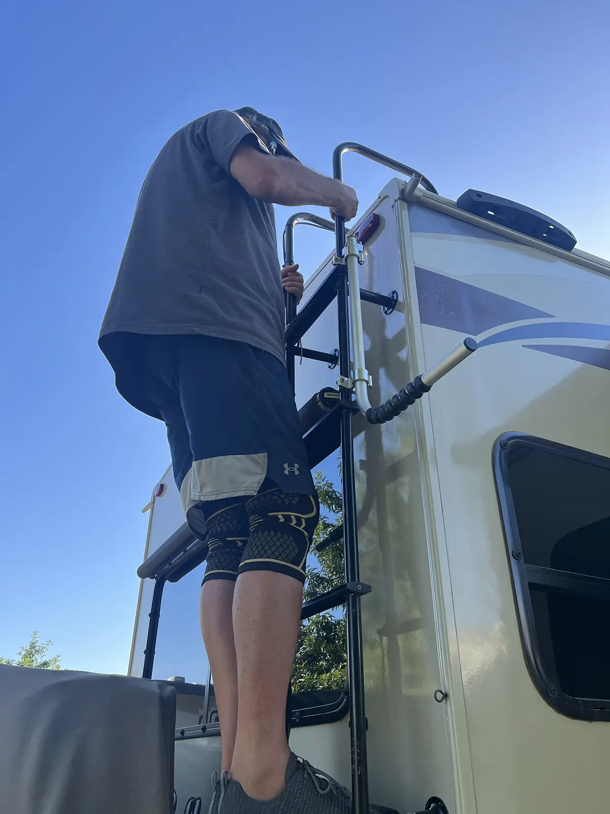 When the arms are turned to the sides, there is plenty of room to climb up the ladder safely. This feature allows the system to remain bolted to the ladder at all times.
