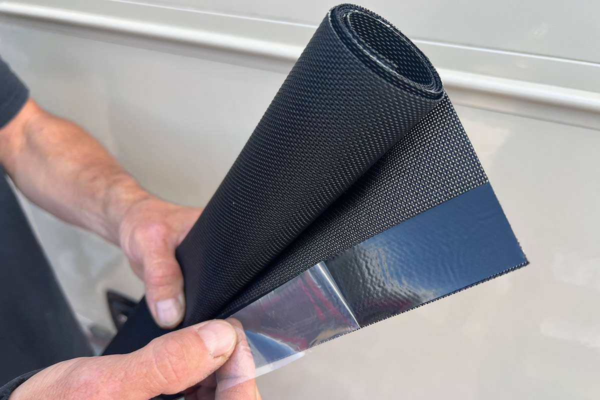 Nano Tape is applied from the factory to the top edge of the Nano Shade. Simply peel off the backing, stick the shade to a window or any smooth surface and let it hang.