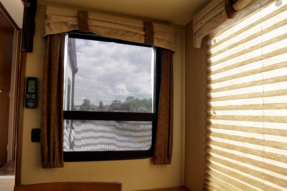 an RV slide room window with a Nano Shade installed