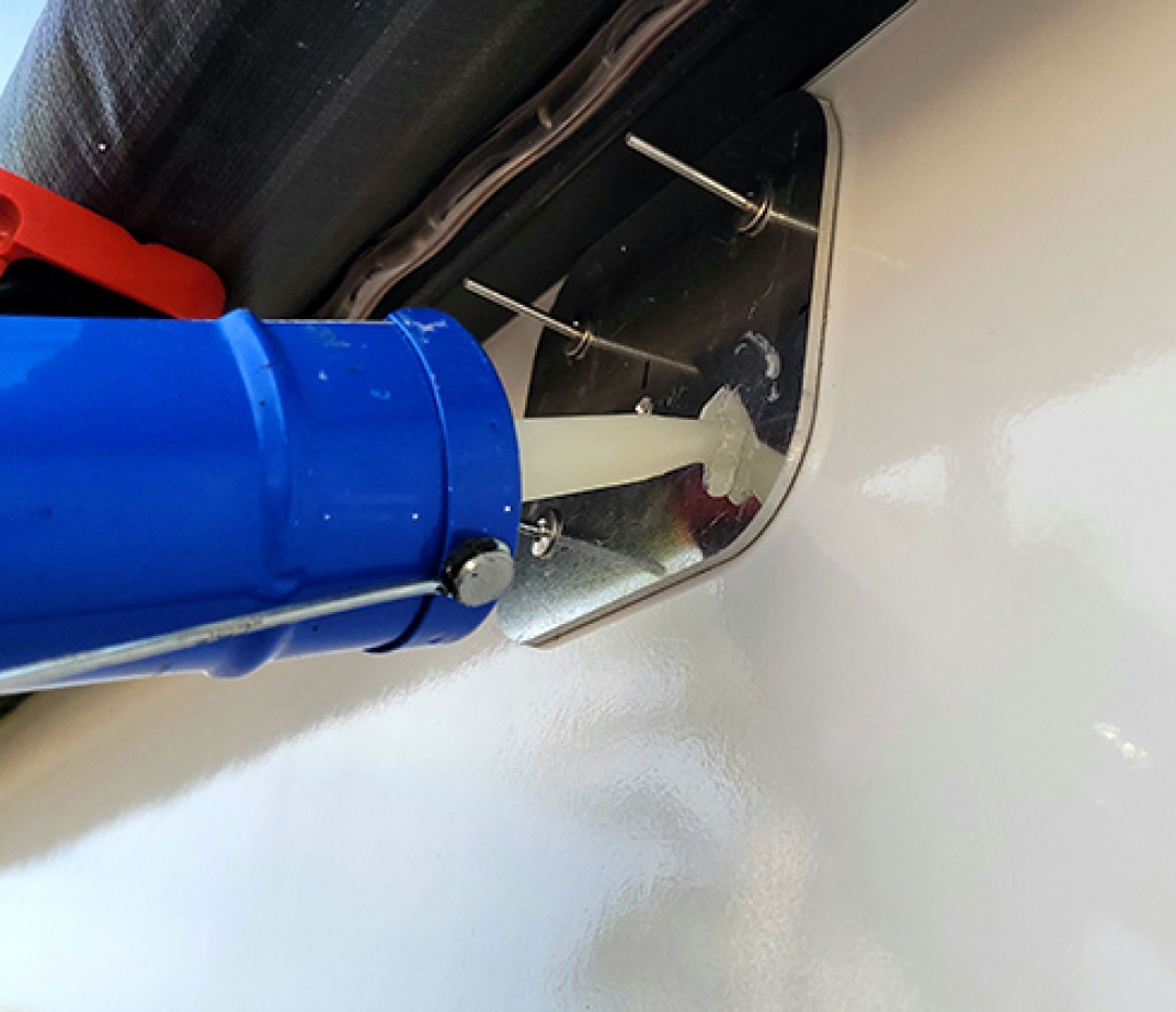 silicone sealant is injected into a hole made on the RV sidewall