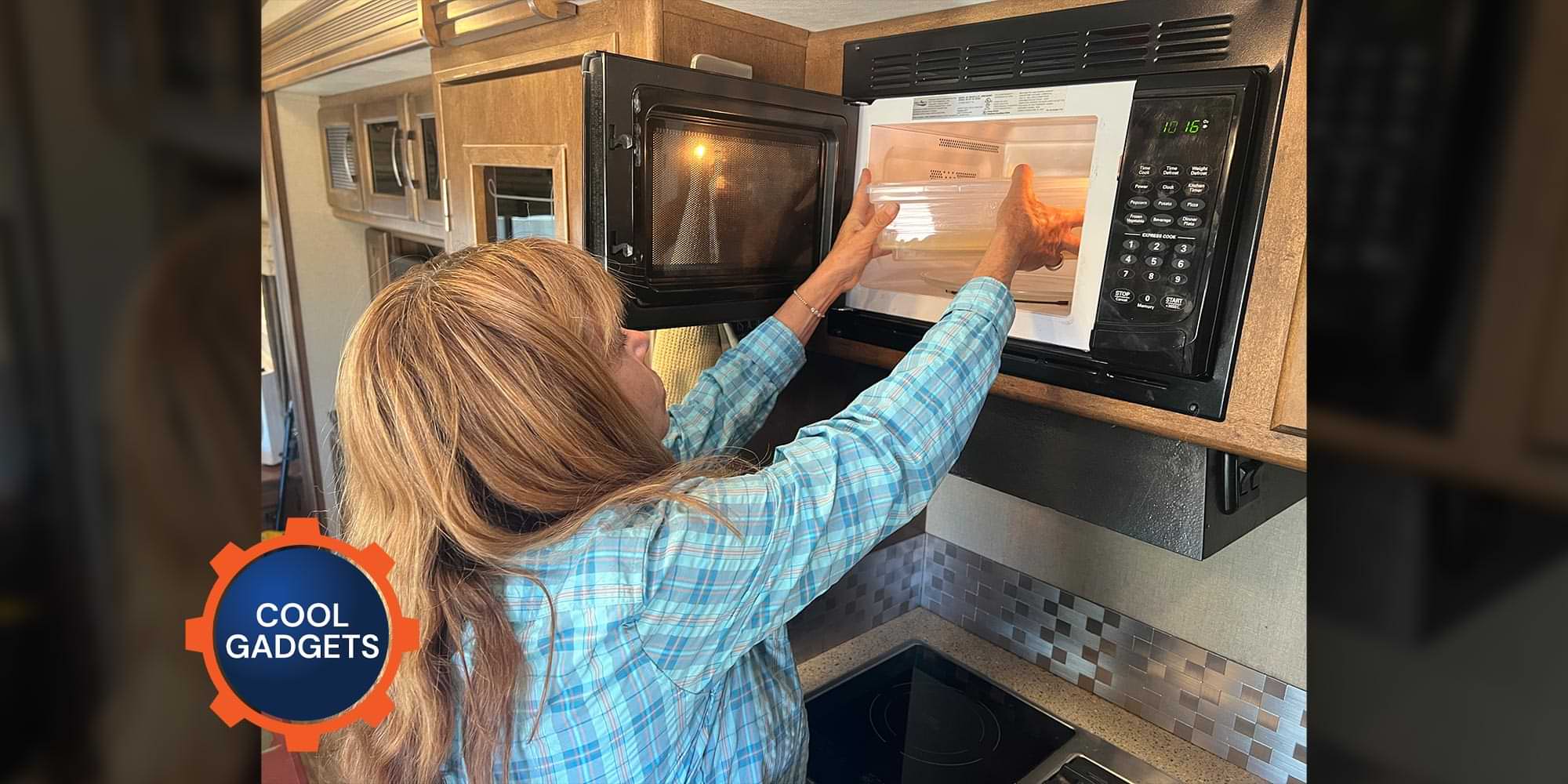 a woman places a rectangular container in an overhead RV microwave