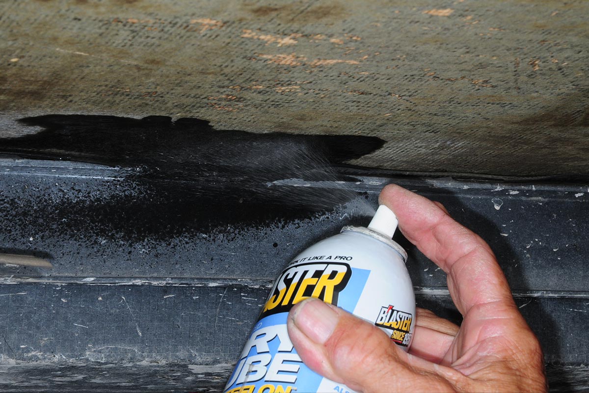 Blaster Dry Lube with Teflon is sprayed in the small area between the RV and slideout floors
