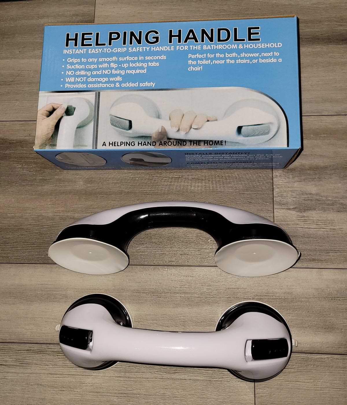 the Helping Handle gadget placed beside its packaging box