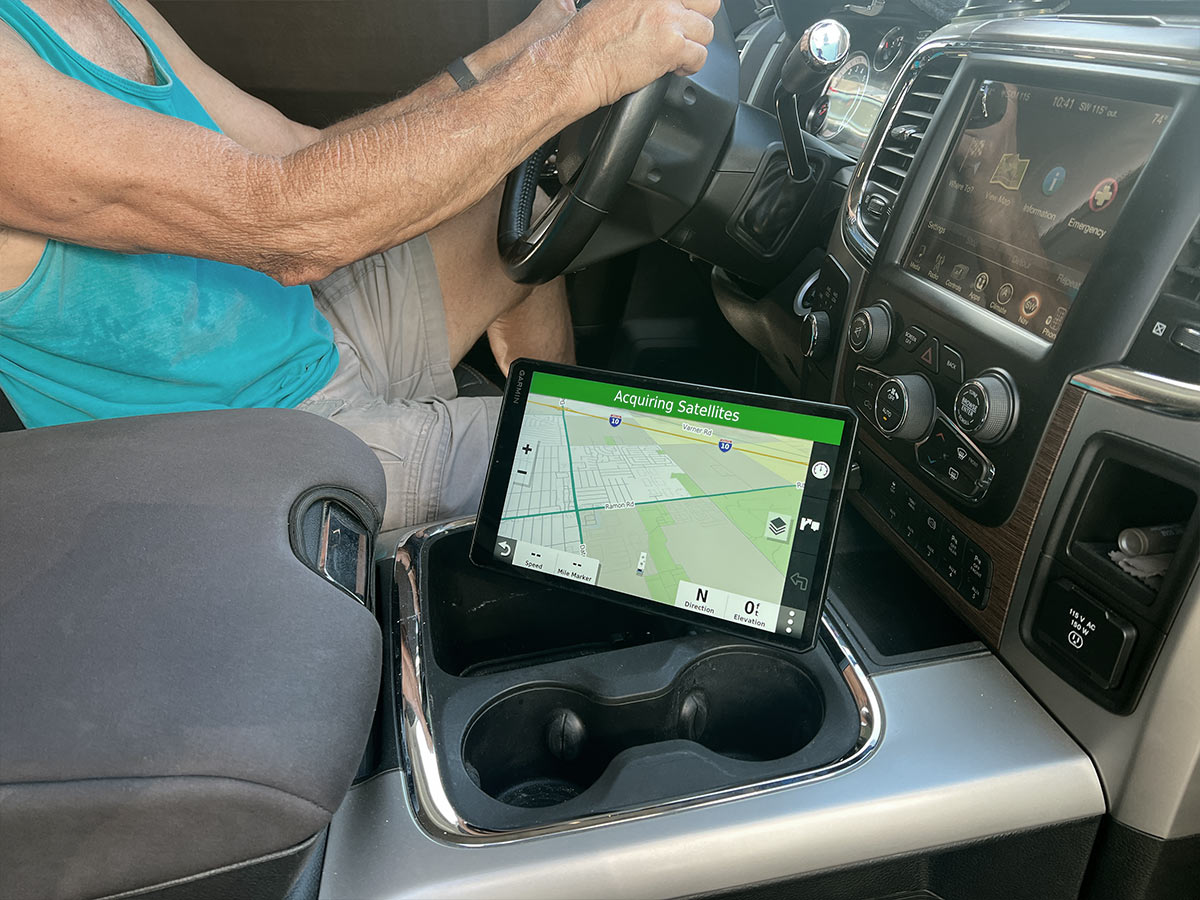 view of the GPS monitor mounted to the vehicle center console and turned in the direction of the passenger seat