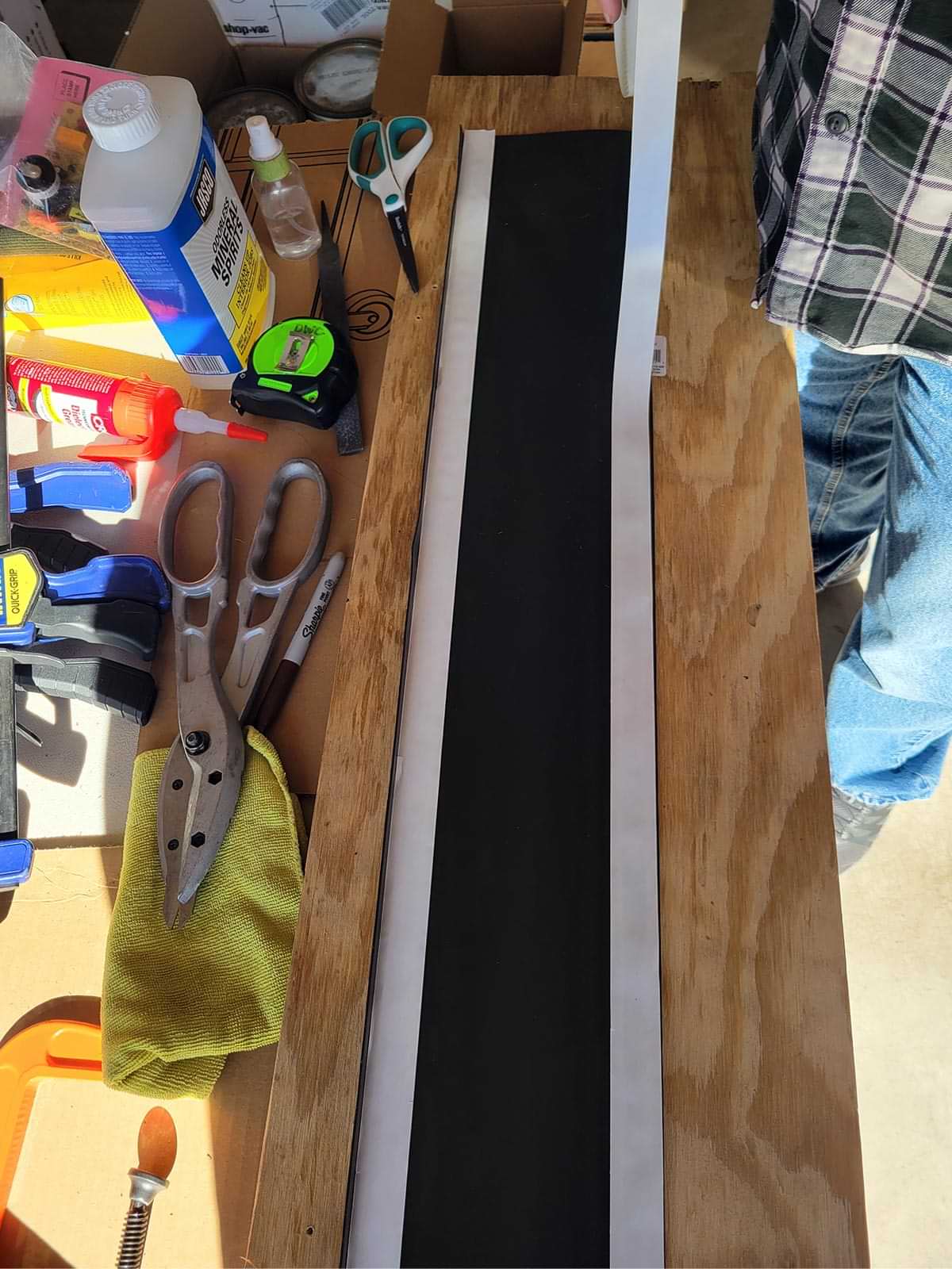 two strips of the Duo Form’s RV Slide Out Ski kit tape is applied to a ski