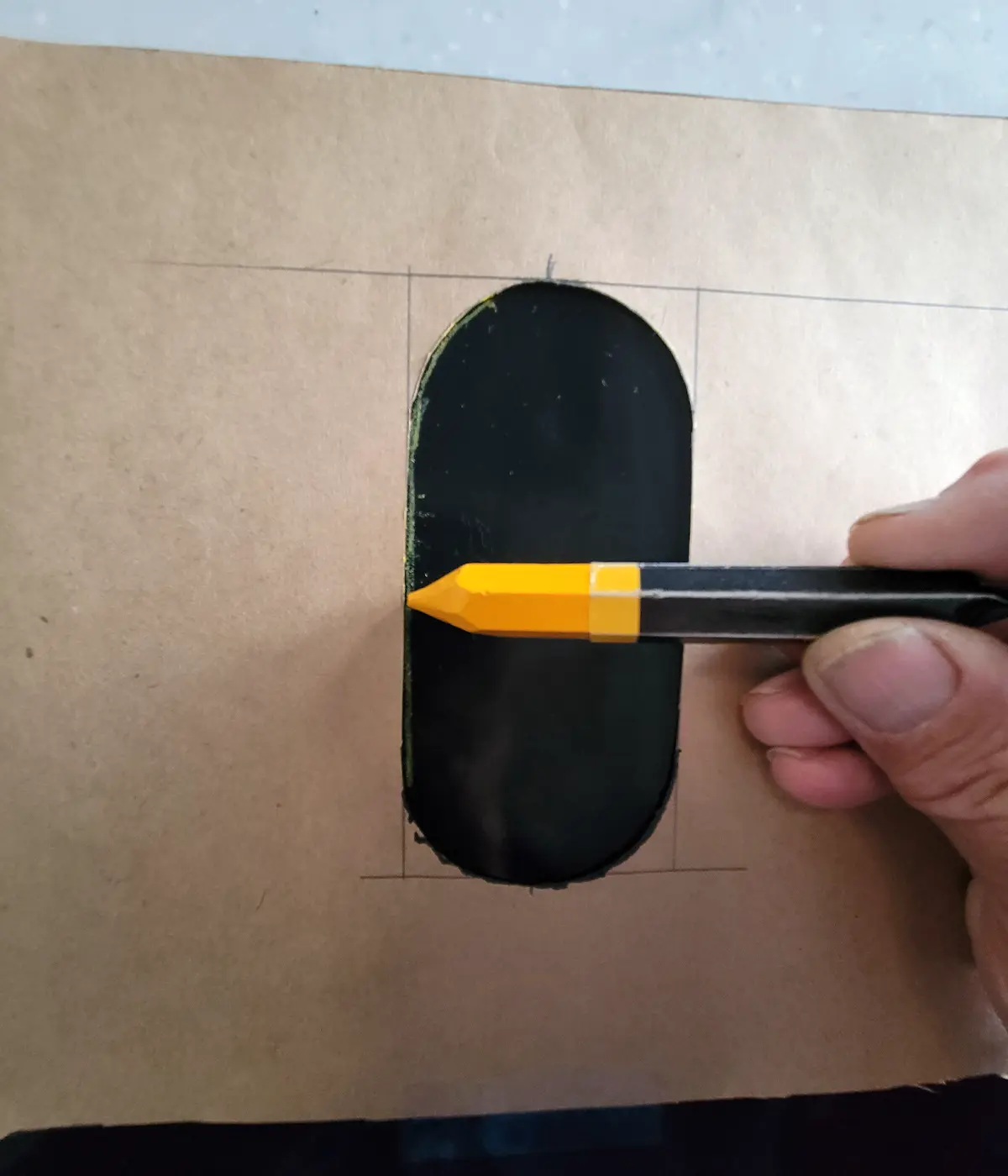 a construction crayon is used to outline the areas to be cut from the silicone mat
