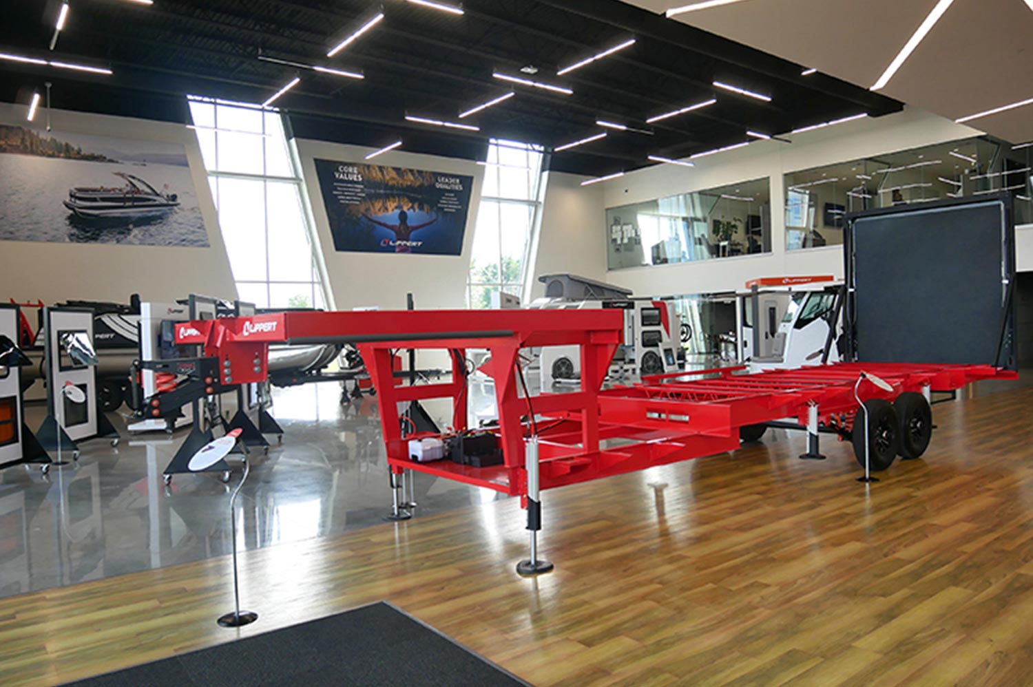 interior view of Lippert’s Elkhart, Ind., headquarters, in the center of the room a specially outfitted Lippert chassis is fitted with many of the company’s latest products