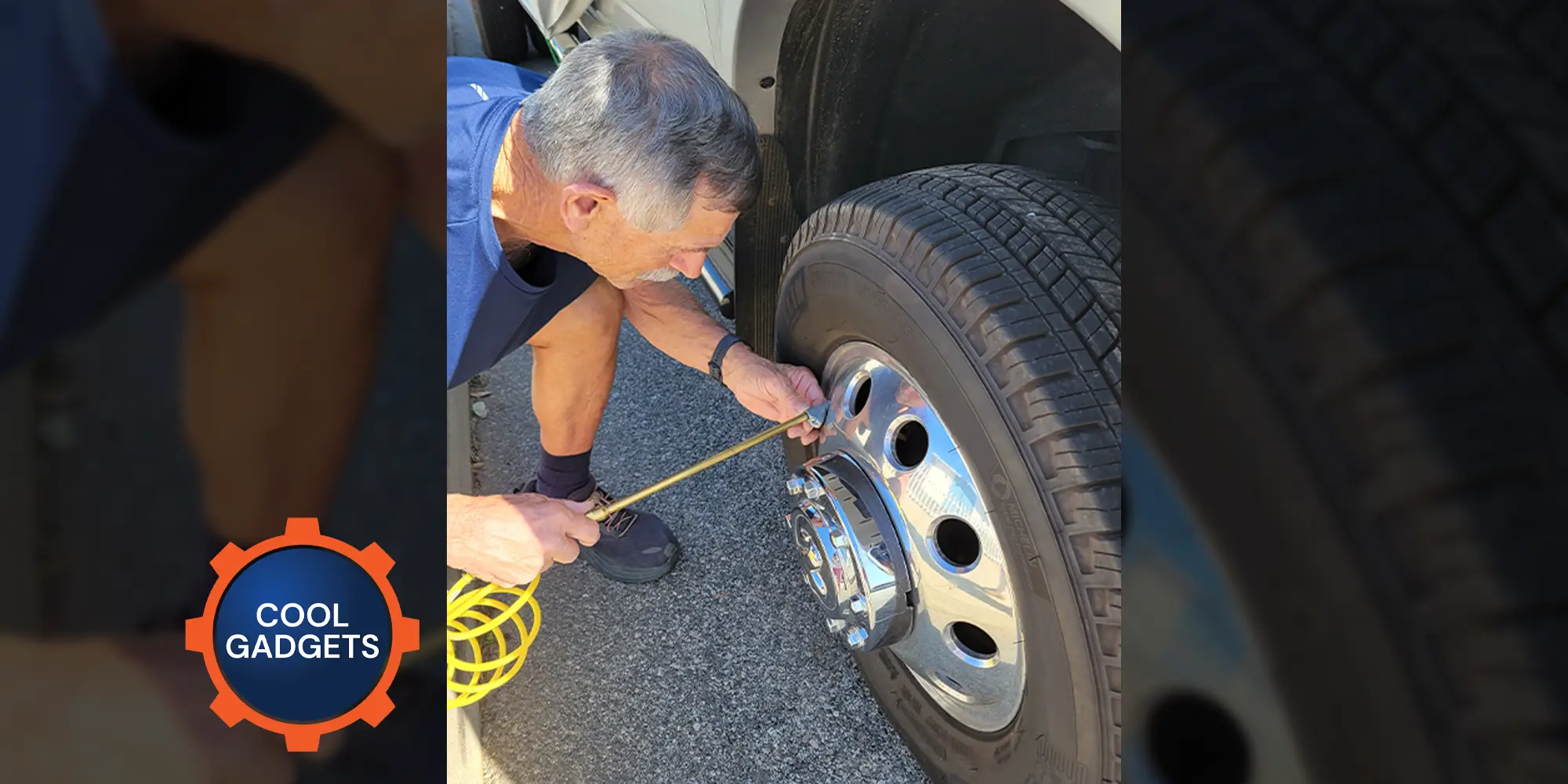 a man kneels beside a heavy duty tire, checking the pressure